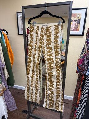 We The Free Tie-Dye Flared Jeans in White and Brown